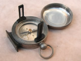 Vintage pocket compass with clinometer function in hunter case